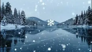 Frozen Winter Lake With Light Snowfall And Cinematic Calm Background Video
