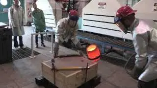 Casting the Michigan Tech Seal in the campus foundry.
