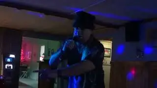 Buck Row singing If You Have Ghosts by GHOST at The Rusty Nail Tavern in Walker on December 26, 2025