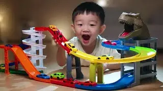 Happy Toddler Playing with Dinosaur Car Race Track 🦖🚗 | Fun Kids Toy Racing Video