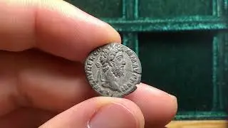 Ancient Roman silver denarius coin of emperor Commodus