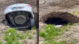 Sinkhole Swallows Parked Car As People Watch Helplessly