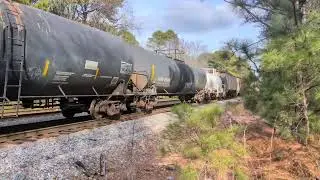 CSX 55 and CSX 3421 lead a south bound mixed freight train past the Duke Energy plant 1/5/2026