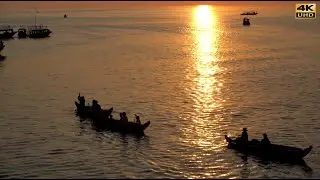Floating Village in Dry Season, Sunset on Tonle Sap lake, Cambodia (4K)