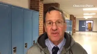 A West Bloomfield voter at Orchard Lake Middle School.