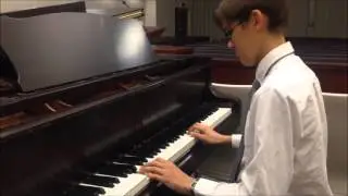 Matthew playing piano at church