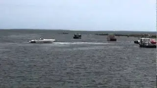 West Island Causeway - Grounded Cigarette boat freed by TowBoat US