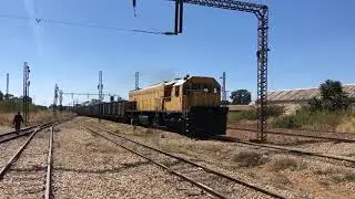 NRZ DE11A 2103 Pulls into Gweru with empty wagons