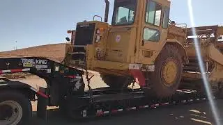 Marcos and Timmy hauling the 623F Cat  Scraper