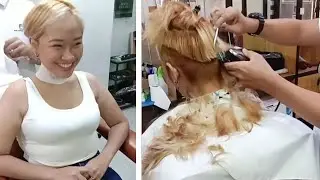 Cute blonde girl at the barber shop