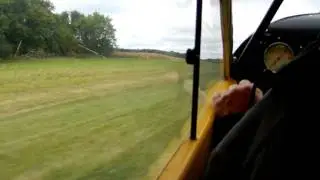 Piper Super Cub - Low approach and soft field landing.