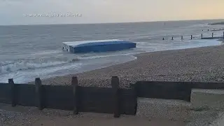 Shipping containers carrying bananas wash up on beach in the U.K.
