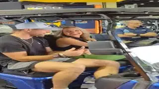 Golf Channel's Lauren Thompson recording at PGA show