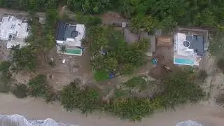 Trabajando en los 60 metros en la playa del Rocon con pala mecanica