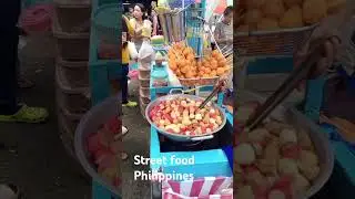 Street food Manila.           Fried Kwek-kwek , fish ball, squid ball, hotdog, kikiam
