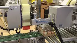 Impression et d&eacute;pose d'&eacute;tiquettes sur le cot&eacute; et la face avant d'un emballage agro-alimentaire
