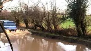 Landrover Defender takes on some flooding