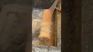 Satisfying Cleanup: Dirty Paint Roller Meets Pressure Washer!
