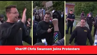 Michigan Sheriff Chris Swanson joins Peaceful protesters as they walk for George Floyd