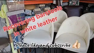 Recovering barstools in leather.