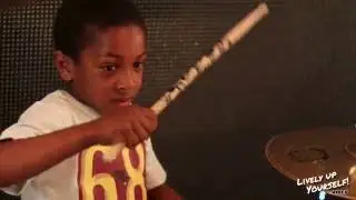 7 year old highly talented drummer jams with reggae band!