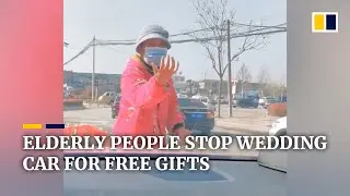Chinese elderly people stop wedding car to demand for free gifts