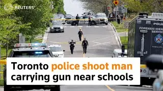 Toronto police shoot man carrying gun near schools