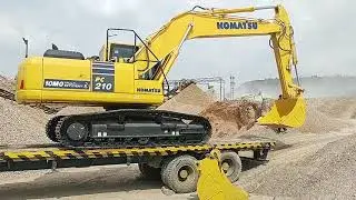 Komatsu PC210-10MO Unloading with temporary Ramp
