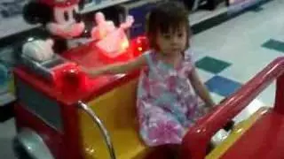 Grace Riding a Car in Toys R Us