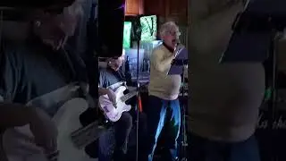 Syd little singing in his pub