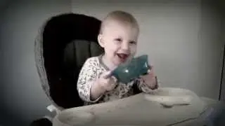 Derek (13mo.) Learning to use a Spoon.