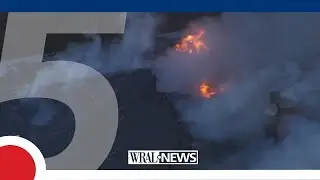 SKY 5: Fire spills out of the roof of northern Wake County home