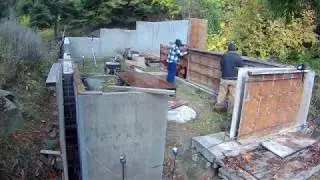 Caretaker Fantasy Cottage (42); The front wall footing has a step-down to meet grade requirements.