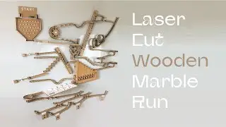 Wooden Marble Run Race on a magnetic whiteboard.