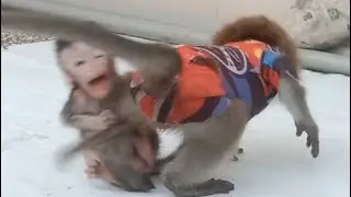 Baby Don does not want to let go of his hug
