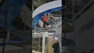 Encasing the CEILING Fabric-GRAPHIC for a BOOTH