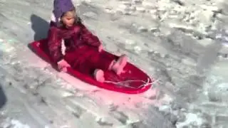 Emma sledding at Rae's house 2