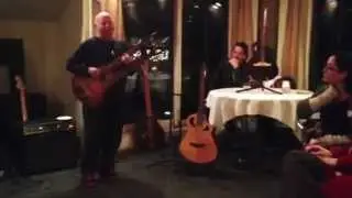 Joe Veillette playing guitar