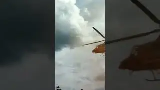 detik detik helicopter merah ..ber asap kuning