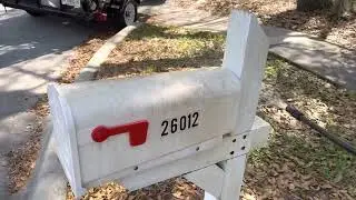 Cleaning a green mailbox