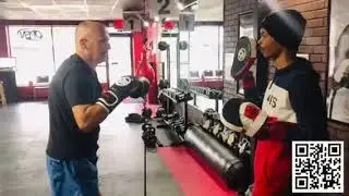 9Round Kickboxing Fitness Fairlawn Focus Mitts With Coach Dash and member JustinCredible