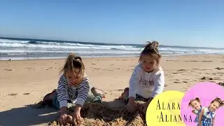 Alara and Alianna have a cold day at the beach