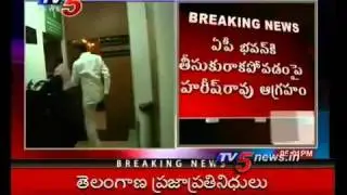 TV5 - TRS MLA Harish rao beats up OSD Official in AP Bhavan