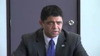 Fijian Attorney General Aiyaz Sayed-Khaiyum presents certificates to four civil marriage officers