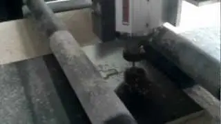 Roller table cutting long boards
