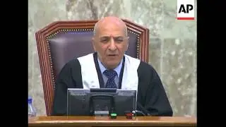 WRAP Saddam defiant appears after hospitalisation, rails at Chief Judge