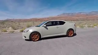 Satin Camo Tan dipped Scion with Mojave orange wheels