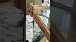 Wooden glass railing Desing by Chanderiya steel and railing accessories #railing #home #glass #wood