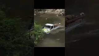 Land Rover Defender 130 Nearly Sideways On River crossing