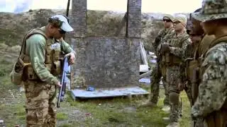 US and Canadian Soldiers Breaching Door With Shotguns